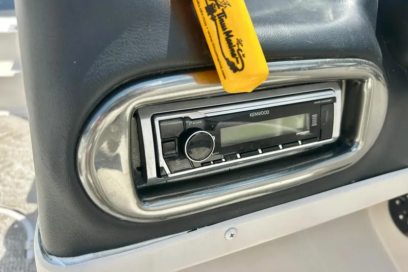 Slide: The Image of Kenwood stereo system in 2009 Starcraft Star Step boat dashboard. - 20