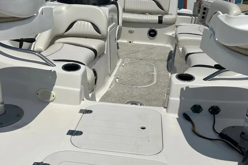 Slide: The Image of 2009 Starcraft Star Step boat interior with seating and cup holders. - 39