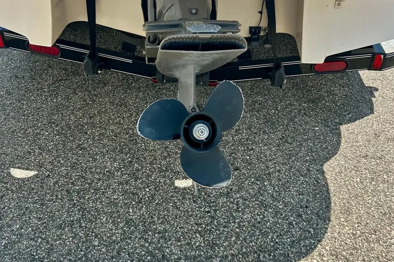 Slide: The Image of 2009 Starcraft Star Step boat propeller on asphalt background. - 5