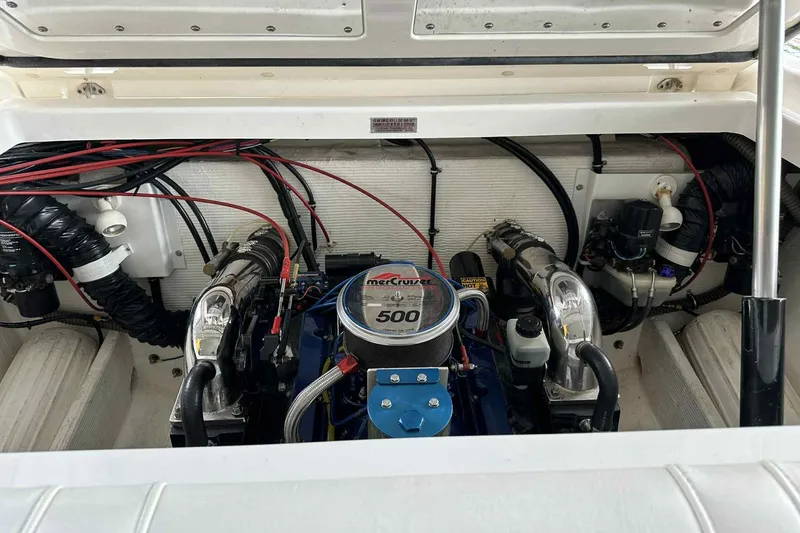 Slide: The Image of Engine compartment of a 1997 Fountain 29 Fever boat with MerCruiser 500 engine. - 11