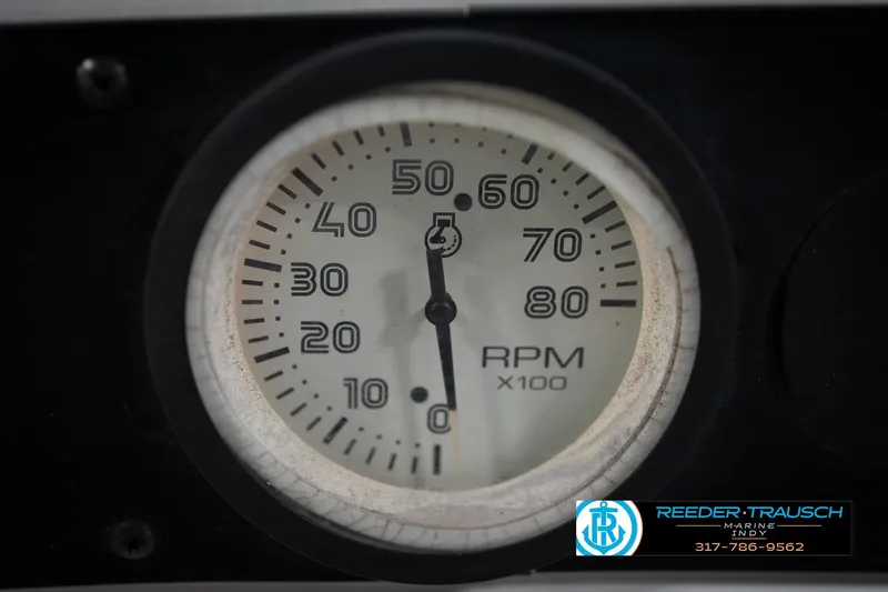 Slide: The Image of Close-up of a 1991 Godfrey SP2200 RPM gauge, displaying up to 80 RPM x100. - 33