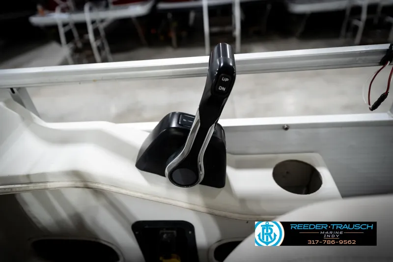 Slide: The Image of Boat throttle control lever on a 1991 Godfrey SP2200, featuring "UP" and "DN" buttons. - 38