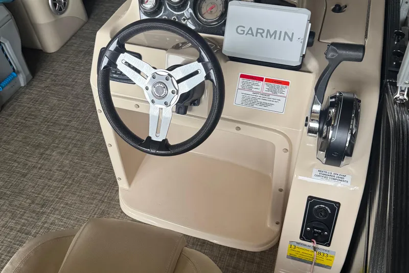 Slide: The Image of Steering console of 2015 Crest III boat with Garmin navigation system. - 3