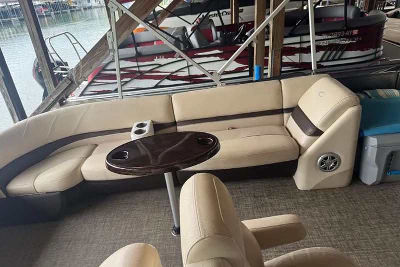 Slide: The Image of Luxurious 2015 Crest III boat interior with beige seating and a round table. - 5