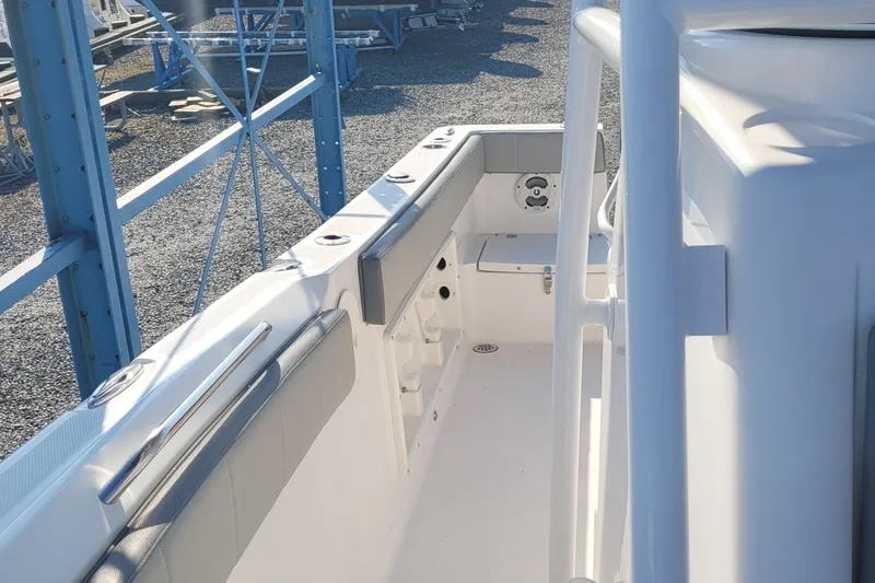 Slide: The Image of 2022 Aquasport 2100 Center Console boat interior with sleek design and modern features. - 26