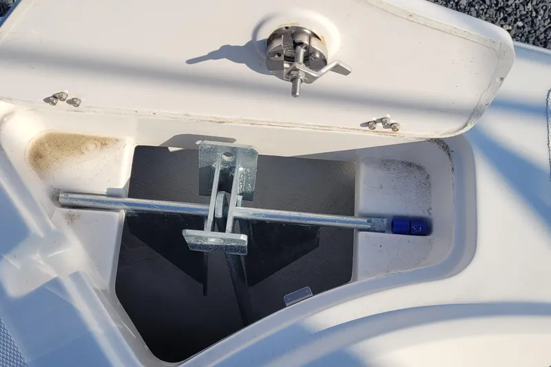 Slide: The Image of Anchor storage compartment on a 2022 Aquasport 2100 Center Console boat. - 33