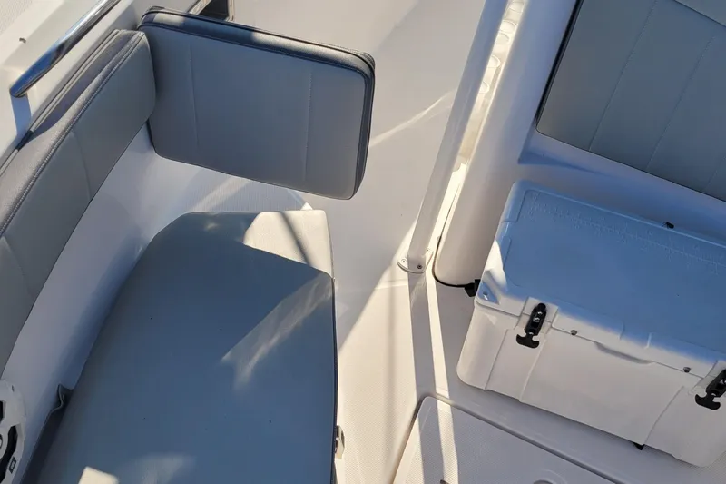 Slide: The Image of 2022 Aquasport 2100 Center Console interior seating and storage view. - 37