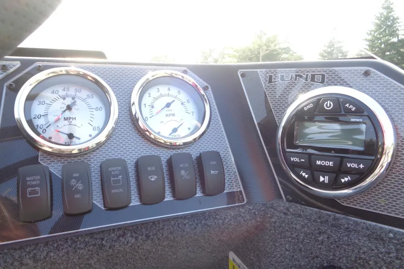 Slide: The Image of Dashboard of 2026 Lund 1775 Adventure SS boat with gauges and controls. - 12
