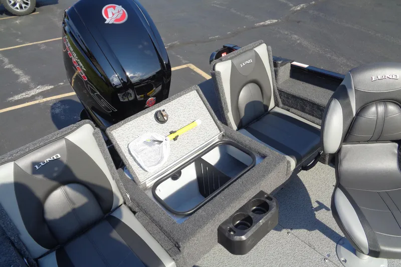 Slide: The Image of 2026 Lund 1775 Adventure SS boat interior with seating and storage compartments. - 18