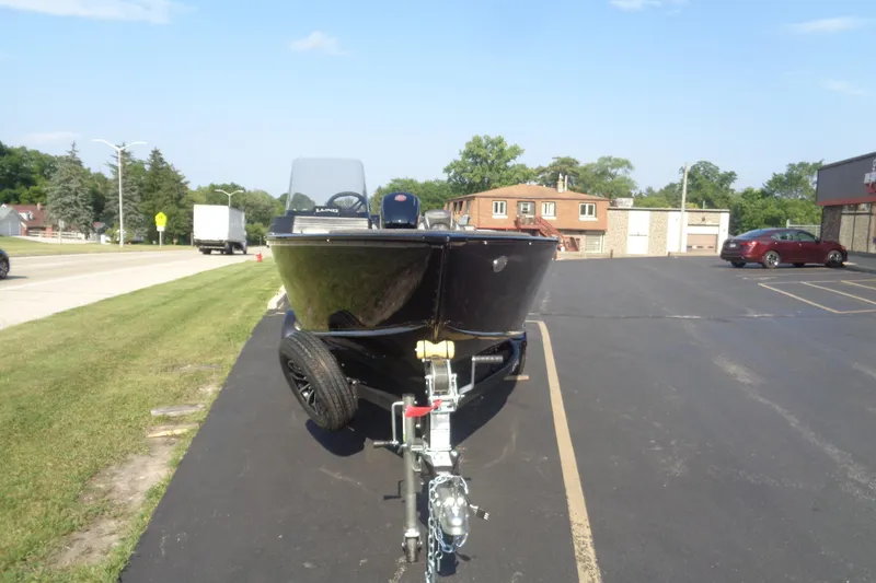 Slide: The Image of 2026 Lund 1775 Adventure SS boat on trailer in parking lot. - 8