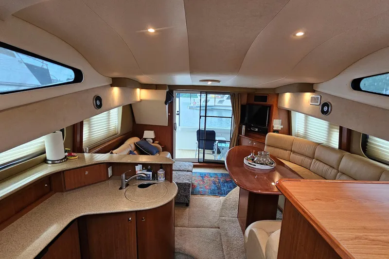 Slide: The Image of Luxurious interior of a 2007 Silverton 38 Sport Bridge yacht with modern amenities. - 33