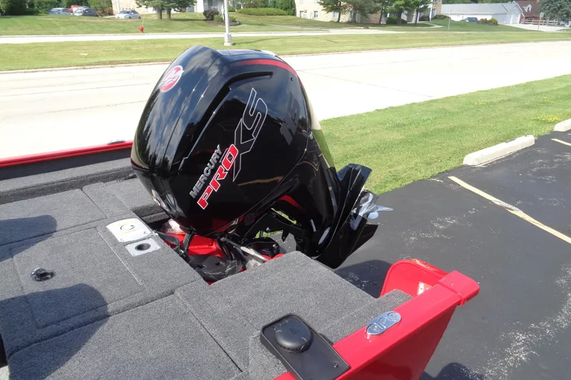 Slide: The Image of 2026 Lund 1775 Adventure SS with Mercury Pro XS outboard motor, parked on pavement. - 5