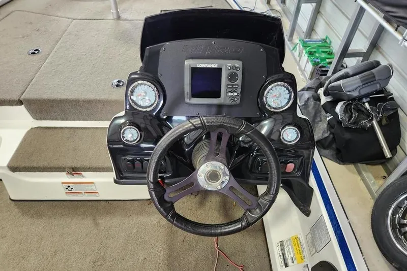 Slide: The Image of Steering console of a 2017 Nitro Z17 boat with gauges and navigation system. - 5