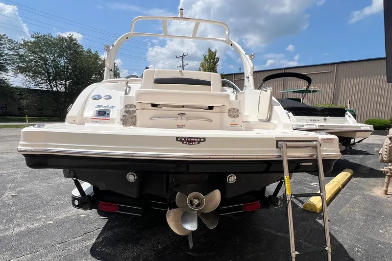 Slide: The Image of 2016 Chaparral 244 Sunesta boat rear view with ladder and propeller. - 15