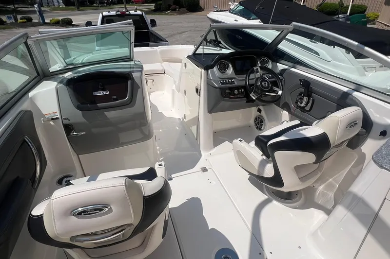 Slide: The Image of 2016 Chaparral 244 Sunesta boat interior with modern dashboard and seating. - 3