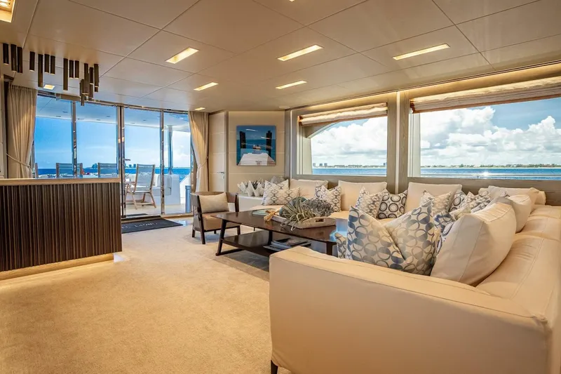 Slide: The Image of Luxurious Horizon RP120 yacht interior with elegant seating, ocean view, and modern decor, 2017 model. - 16