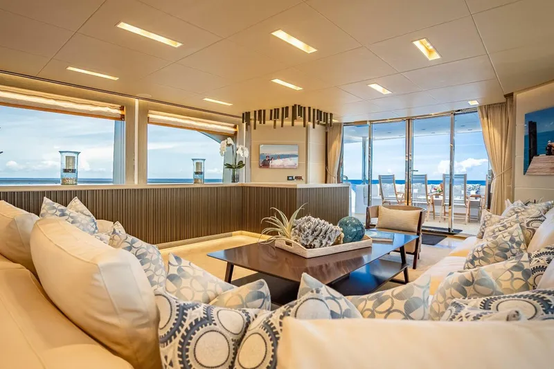 Slide: The Image of Luxurious Horizon RP120 yacht interior with ocean view, elegant decor, and plush seating, 2017 model. - 19