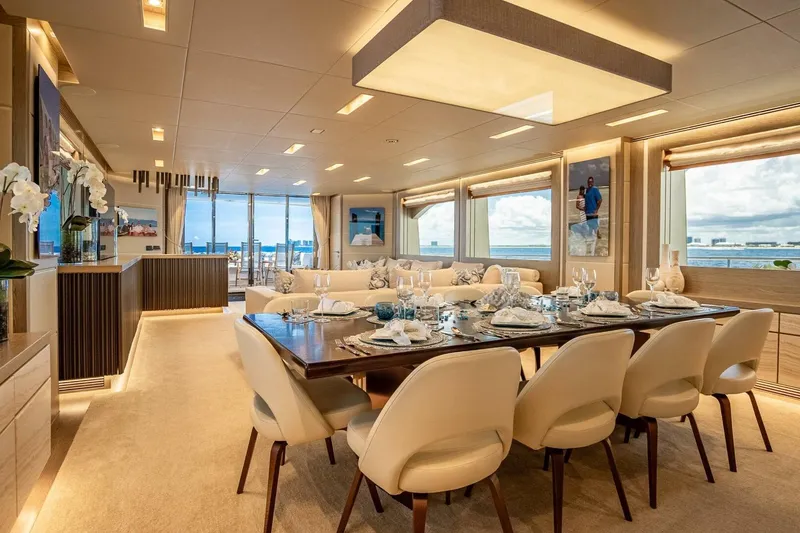 Slide: The Image of Luxurious dining area on 2017 Horizon RP120 yacht with elegant decor and ocean views. - 25
