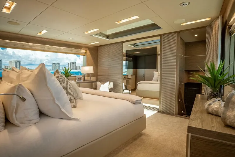 Slide: The Image of Luxurious bedroom interior on 2017 Horizon RP120 yacht with cityscape view. - 33