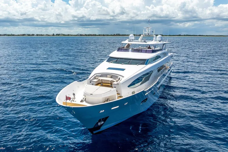 Slide: The Image of Luxurious 2017 Horizon RP120 yacht cruising on open sea under cloudy sky. - 4
