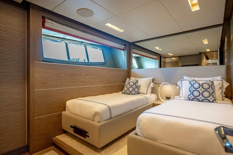 Slide: The Image of Luxurious twin bedroom in 2017 Horizon RP120 yacht with modern decor and large windows. - 43