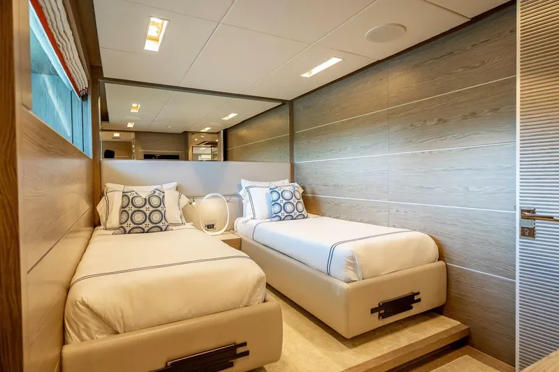 Slide: The Image of Luxurious twin bedroom in 2017 Horizon RP120 yacht with modern decor and elegant bedding. - 45