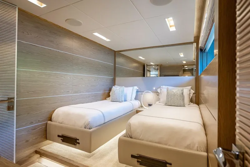Slide: The Image of Luxurious twin bedroom in 2017 Horizon RP120 yacht, featuring modern design and elegant decor. - 49
