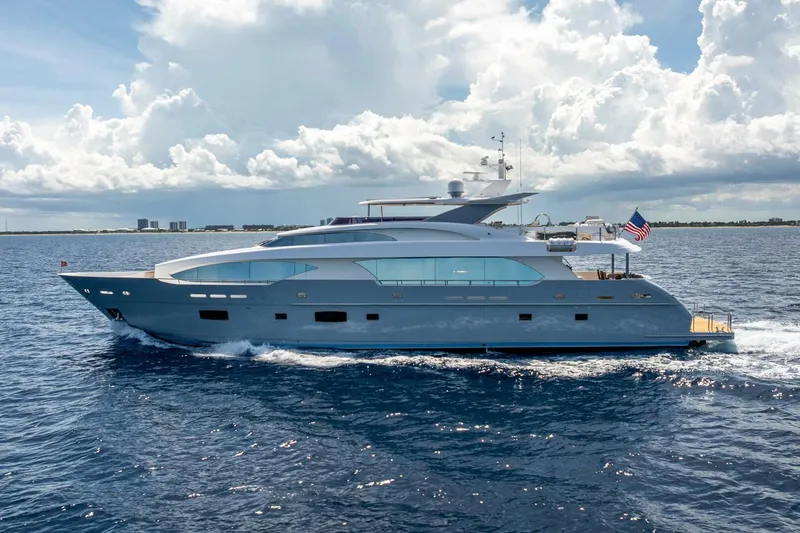 Slide: The Image of Luxurious 2017 Horizon RP120 yacht cruising on open sea under cloudy sky. - 5