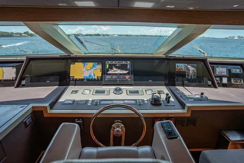 Slide: The Image of Luxurious 2017 Horizon RP120 yacht helm with advanced navigation systems and panoramic ocean view. - 53