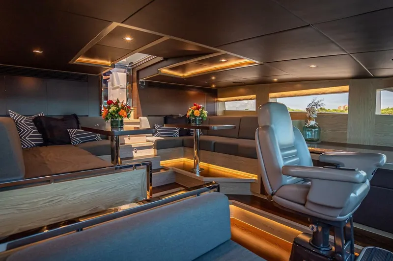Slide: The Image of Luxurious interior of 2017 Horizon RP120 yacht with elegant seating and ambient lighting. - 56