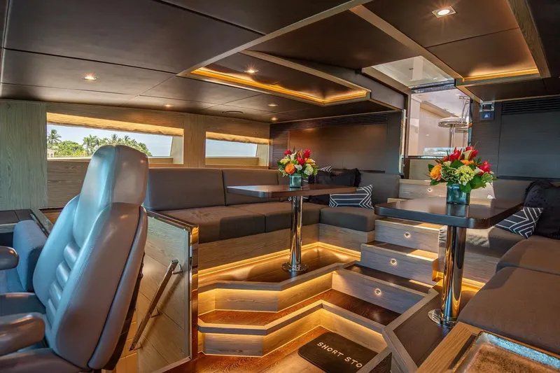 Slide: The Image of Luxurious interior of 2017 Horizon RP120 yacht with elegant seating and floral arrangements. - 57