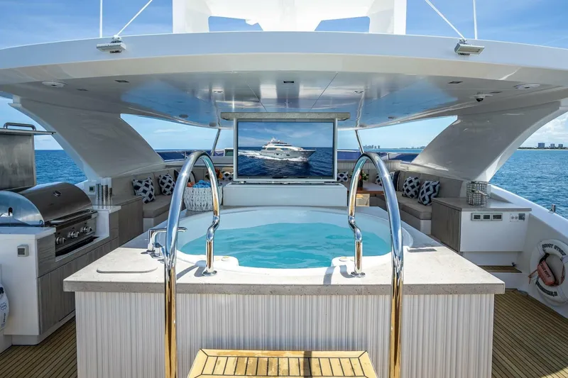 Slide: The Image of Luxury yacht Horizon RP120, 2017 model, featuring a jacuzzi and ocean view. - 60