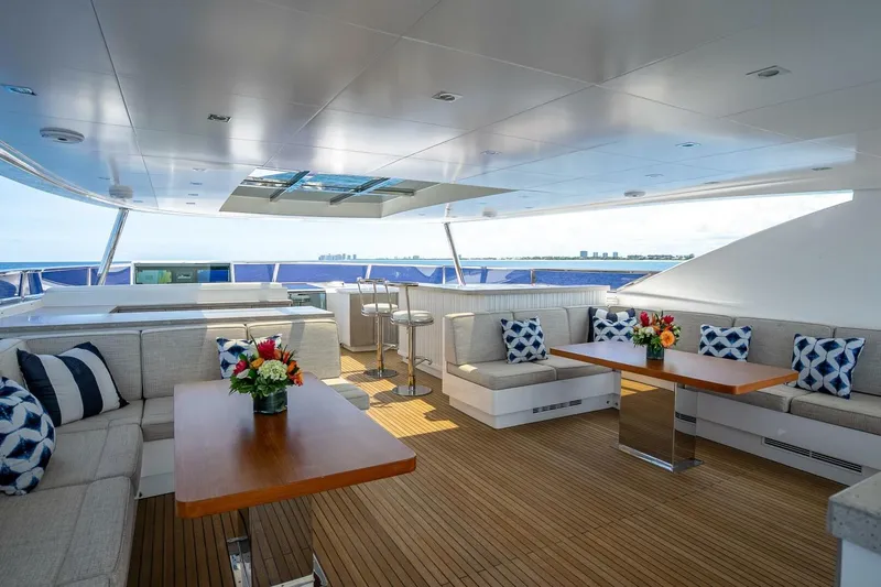 Slide: The Image of Luxurious 2017 Horizon RP120 yacht deck with elegant seating and ocean view. - 61