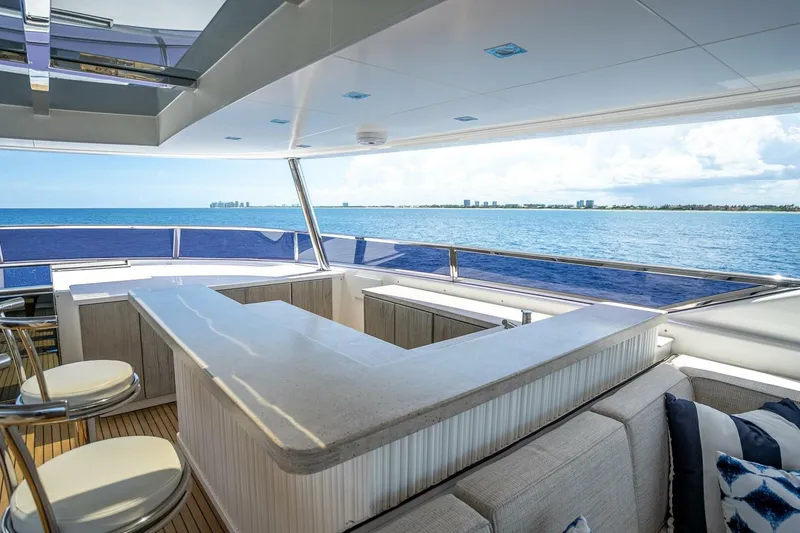 Slide: The Image of Luxurious Horizon RP120 yacht deck with bar, ocean view, and modern seating, 2017 model. - 63