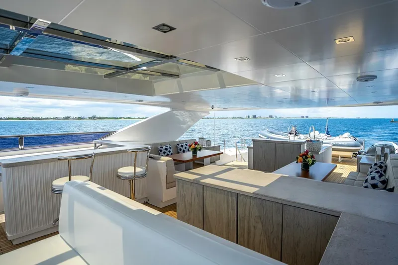 Slide: The Image of Luxurious Horizon RP120 yacht interior with ocean view, featuring elegant seating and modern design, 2017 model. - 67