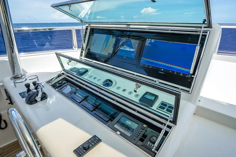 Slide: The Image of Control panel of 2017 Horizon RP120 yacht with navigation screens and controls. - 69