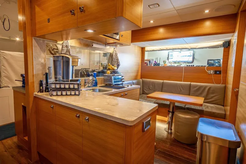 Slide: The Image of Luxurious Horizon RP120 yacht interior with modern kitchen and cozy dining area, 2017 model. - 75