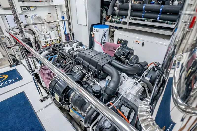 Slide: The Image of Engine room of 2017 Horizon RP120 yacht, featuring advanced machinery and equipment. - 83
