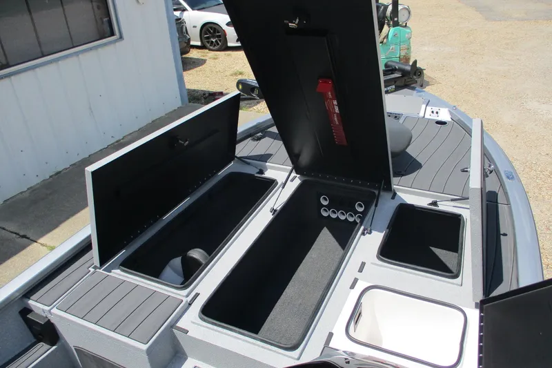 Slide: The Image of 2026 Vexus AVX1980 boat storage compartments open, showcasing interior features and design. - 10