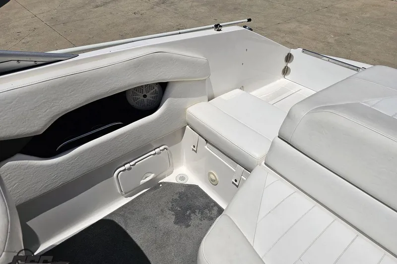 Slide: The Image of 2007 Regal 2000 Bowrider interior with white seating and speaker detail. - 101
