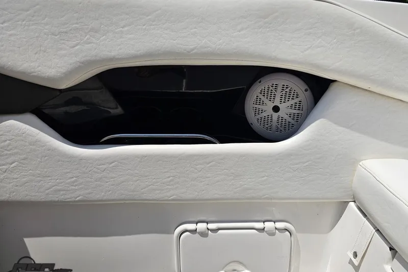 Slide: The Image of Interior speaker detail of 2007 Regal 2000 Bowrider boat with white upholstery. - 110