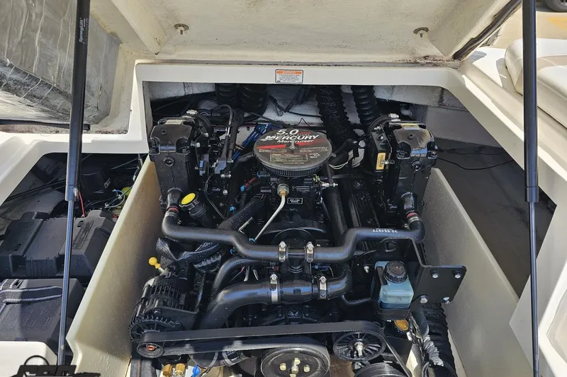 Slide: The Image of 2007 Regal 2000 Bowrider engine compartment with 5.0 Mercury motor. - 113