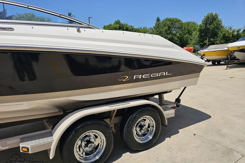 Slide: The Image of 2007 Regal 2000 Bowrider on trailer, parked outdoors on a sunny day. - 19