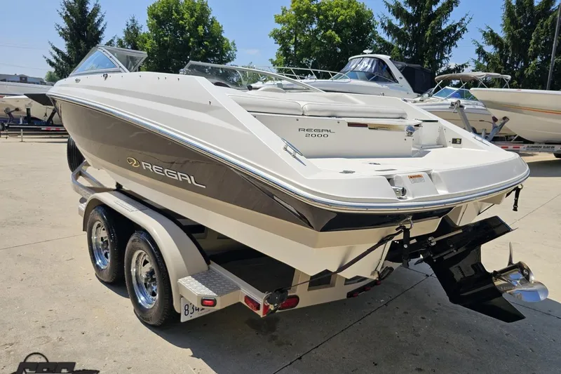 Slide: The Image of 2007 Regal 2000 Bowrider boat on trailer, parked outdoors. - 26