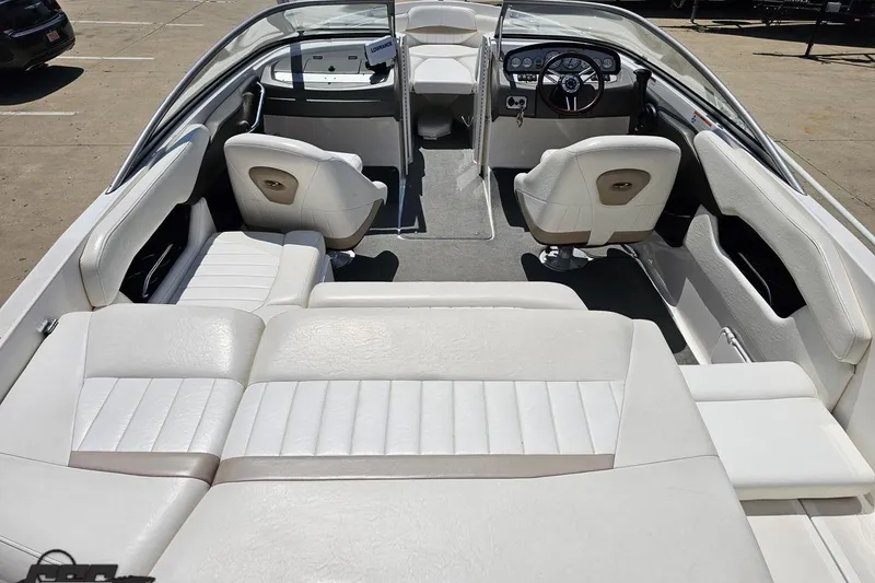 Slide: The Image of 2007 Regal 2000 Bowrider interior with white seating and steering wheel. - 39