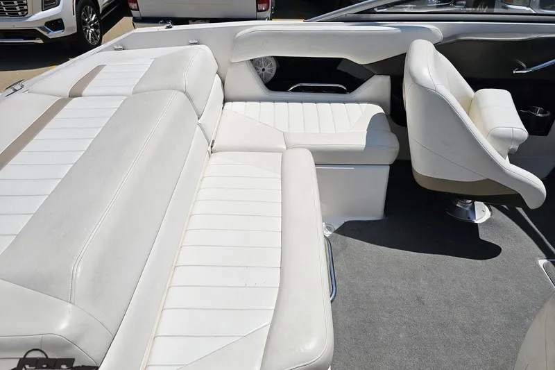 Slide: The Image of 2007 Regal 2000 Bowrider interior with white seating and gray carpet. - 47