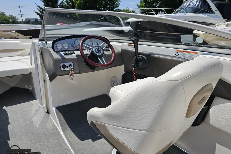 Slide: The Image of 2007 Regal 2000 Bowrider interior with steering wheel and dashboard controls. - 50