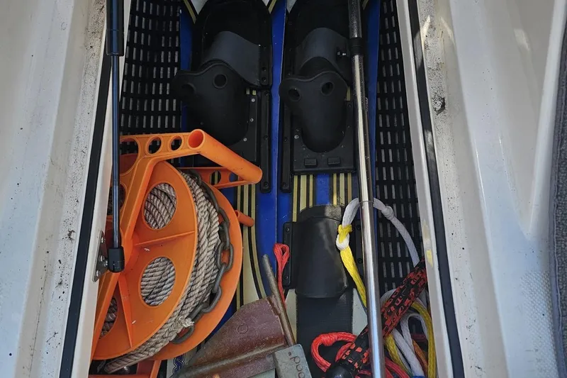 Slide: The Image of Storage compartment of 2007 Regal 2000 Bowrider with boating equipment and accessories. - 53