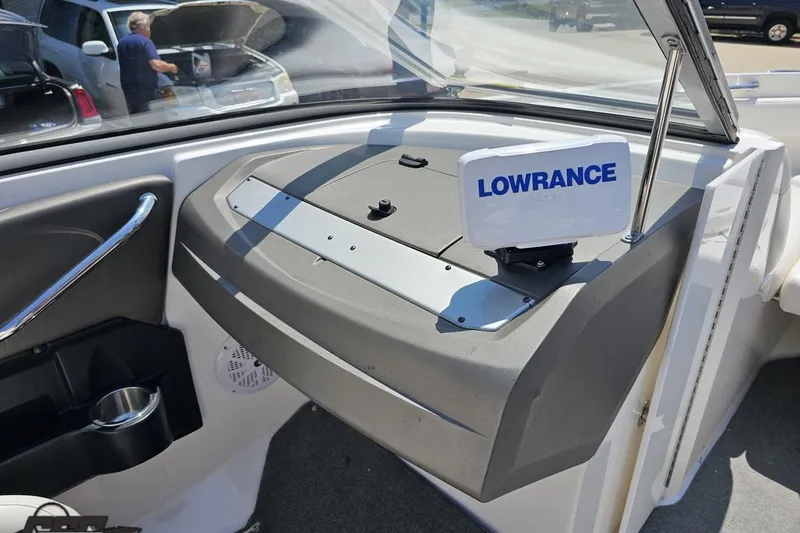 Slide: The Image of 2007 Regal 2000 Bowrider dashboard with Lowrance GPS system. - 56