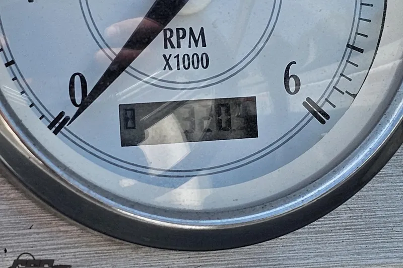 Slide: The Image of Close-up of a 2007 Regal 2000 Bowrider RPM gauge showing 3,200 RPM. - 65